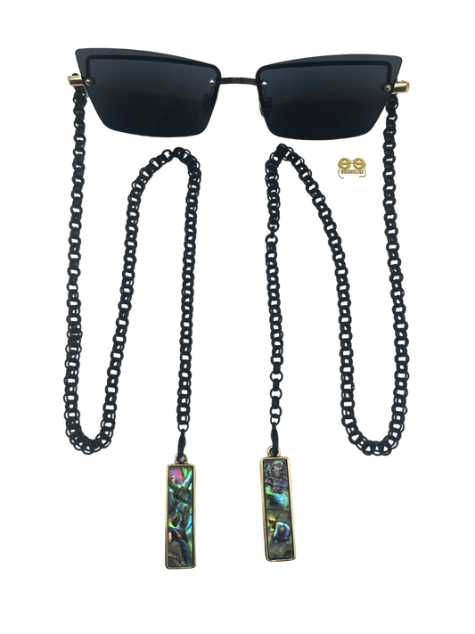 "New Attitude" glasses by Orion Elise. Sleek black frame with bold black chain and abalone accents for intentional thinkers and fashion moguls.