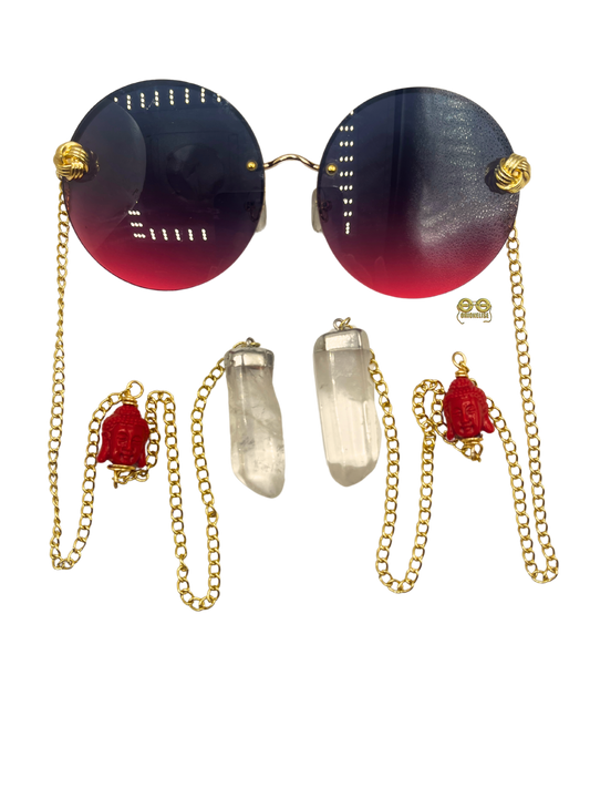 Zensational fashion eyewear by Orion Elise. Chain link glasses with striking red frame and gold custom red deity head chain. Clear quartz on ends radiates purity and clarity. Empower yourself and embrace your true potential with Zensational.